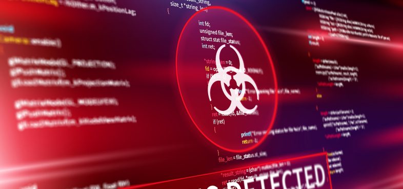 Pictorial representation of the npm packages supply chain attack. Screen displaying code with a prominent alert symbol and the words 'VIRUS DETECTED' highlighted in red.